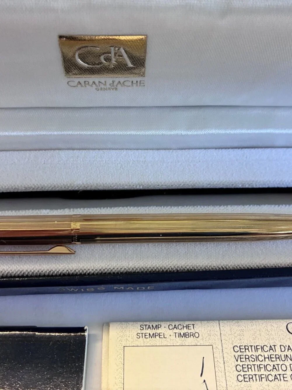 CARAN D'ACHE GOLD BALLPOINT PEN FROM MID 1980s WITH PAPERS AND BOX